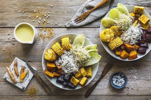 Autumn roast vegetable bowl with aromatic YOGI TEA® Turmeric Chai flavoured rice